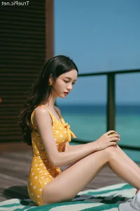 Jeong Hee Redefines Summer Elegance in Latest Monokini Shoot - image 12