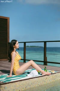 Jeong Hee Redefines Summer Elegance in Latest Monokini Shoot - image 14