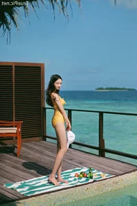 Jeong Hee Redefines Summer Elegance in Latest Monokini Shoot - image 15