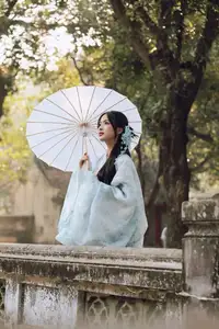 Discovering Traditional East Asian Beauty: Elegant Young Woman in Ancient Vietnamese Setting - image 3