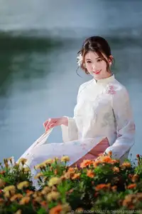 Enchanting East Asian Beauty: A Serene Muse in White Cheongsam under Soft Sunlight by the Lake. - image 2
