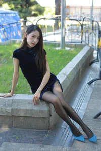 Traditional Elegance Meets Modern Style: Mei Zi in Black Silk Cheongsam - image 26