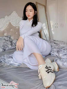 Le Bong in White Ao Dai: A Perfect Blend of Tradition and Modernity - image 19