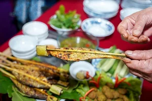 Grilled Sardines: Discover the Traditional Culinary Gem of Bat Trang Village - image 4