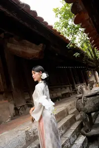 Elegant Asian Beauty: A Portrait of Grace with Traditional Paper Umbrella - Captivating Serenity - image 3