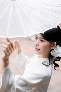 Elegant Asian Beauty: A Portrait of Grace with Traditional Paper Umbrella - Captivating Serenity - image 4