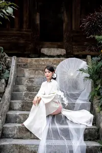 Elegant Asian Beauty: A Portrait of Grace with Traditional Paper Umbrella - Captivating Serenity - image 5