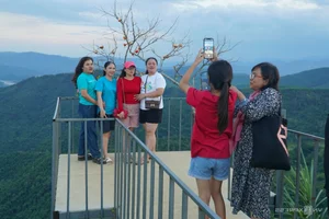 Experience the Magic of Cloud Hunting: A Breathtaking Escape to Vietnam's Lush Green Highlands and Rolling Sea of Clouds - image 1