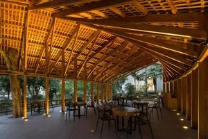 Architectural Marvels: The Stunning Curved Wooden Restaurant Nestled in Hanoi's Lush Forest - image 5