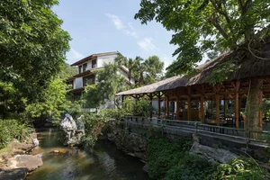 Architectural Marvels: The Stunning Curved Wooden Restaurant Nestled in Hanoi's Lush Forest - image 0
