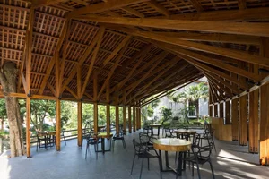 Architectural Marvels: The Stunning Curved Wooden Restaurant Nestled in Hanoi's Lush Forest - image 4