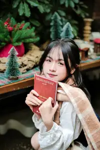 Cozy Christmas Reading: Young Woman and 'How to Win Friends' Book - image 12