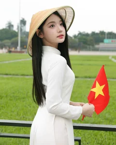 The Mukbang Fairy Captivates Fans in Traditional Ao Dai and Conical Hat - image 5