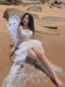 Vo Ngoc Tran’s Radiant Summer Glow: Exploring the Visual Aesthetic of Vietnam’s Top Influencer - image 89
