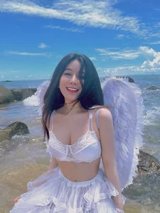Vo Ngoc Tran’s Radiant Summer Glow: Exploring the Visual Aesthetic of Vietnam’s Top Influencer - image 0