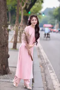 Gentle Pink Ao Dai: Vietnamese Beauty Shines by Hoan Kiem Lake in Spring Hanoi - image 9