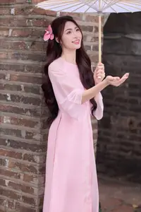 Gentle Pink Ao Dai: Vietnamese Beauty Shines by Hoan Kiem Lake in Spring Hanoi - image 8