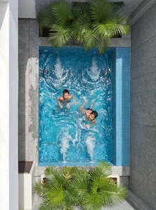 Modern Eco-Friendly Home Design Inspired by Tropical Coconut Leaves in Ho Chi Minh City: A Sustainable Architectural Masterpiece with Split-Level Living - image 6