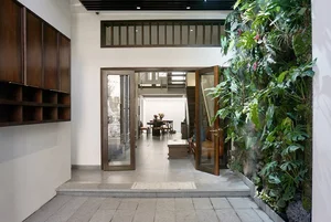 Modern Eco-Friendly Home Design Inspired by Tropical Coconut Leaves in Ho Chi Minh City: A Sustainable Architectural Masterpiece with Split-Level Living - image 1