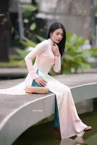Graceful Vietnamese Lady in Traditional Ao Dai  1000024954 - image 7