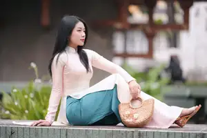 Graceful Vietnamese Lady in Traditional Ao Dai  1000024954 - image 12