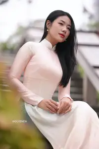 Graceful Vietnamese Lady in Traditional Ao Dai  1000024954 - image 25