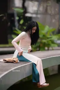 Graceful Vietnamese Lady in Traditional Ao Dai  1000024954 - image 30