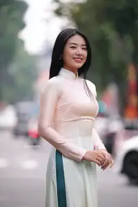 Graceful Vietnamese Lady in Traditional Ao Dai  1000024954 - image 9