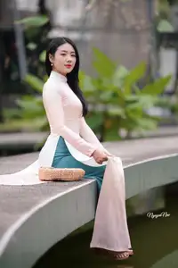Graceful Vietnamese Lady in Traditional Ao Dai  1000024954 - image 27