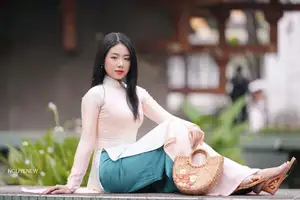 Graceful Vietnamese Lady in Traditional Ao Dai  1000024954 - image 21