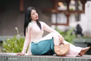 Graceful Vietnamese Lady in Traditional Ao Dai  1000024954 - image 11