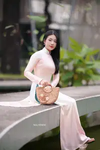 Graceful Vietnamese Lady in Traditional Ao Dai  1000024954 - image 14
