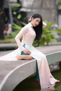 Graceful Vietnamese Lady in Traditional Ao Dai  1000024954 - image 5