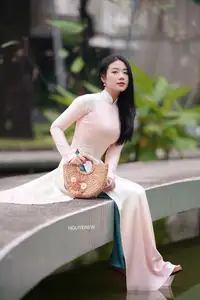 Graceful Vietnamese Lady in Traditional Ao Dai  1000024954 - image 31