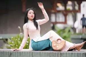 Graceful Vietnamese Lady in Traditional Ao Dai  1000024954 - image 1