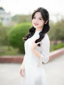 Discover the Timeless Charm of a Vietnamese Girl in Elegant White Ao Dai - image 3