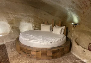 Stay in a Masterpiece: The 17-Room Luxury Hotel Carved into Ancient Stone - image 8