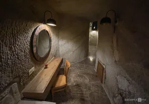 Stay in a Masterpiece: The 17-Room Luxury Hotel Carved into Ancient Stone - image 9