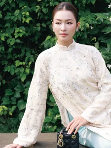 Kha Ngan radiates pure elegance in a traditional Vietnamese Ao Dai - image 1