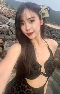 Multilingual Laotian Influencer Captivates Social Media with Stunning Bikini Photos - image 8
