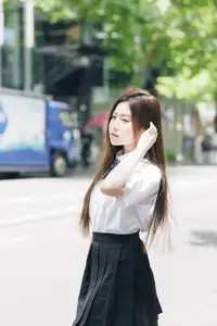 Charming Schoolgirl Embraces Street Style with Classic Uniform. - image 1