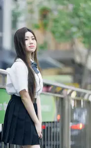 Charming Schoolgirl Embraces Street Style with Classic Uniform. - image 0