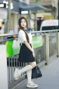 Charming Schoolgirl Embraces Street Style with Classic Uniform. - image 6