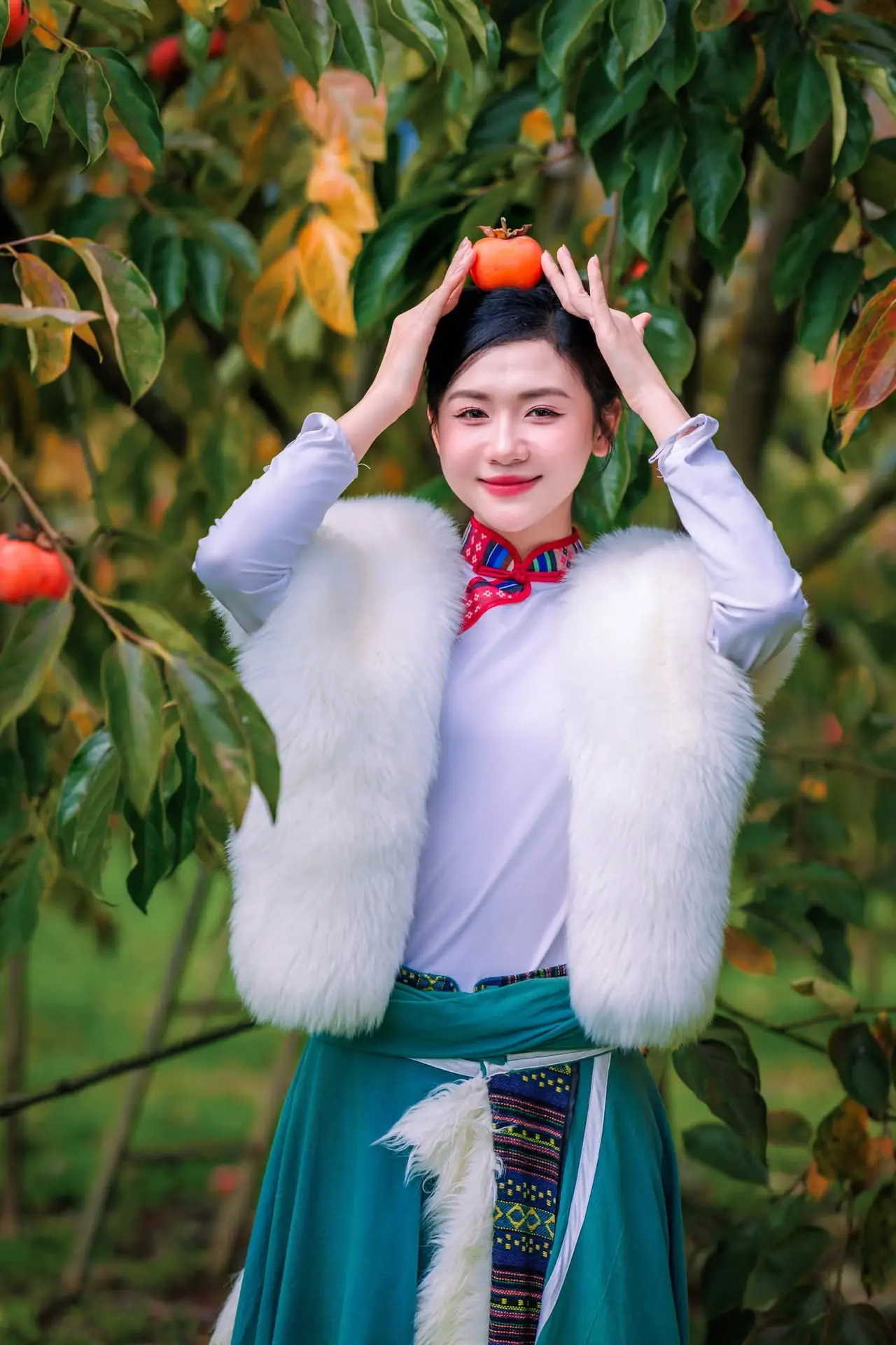 Graceful Vietnamese Girl in Traditional Attire Amidst Autumn Persimmon Garden