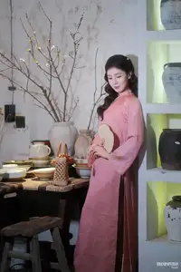 Serene Beauty of a Lady in Pink Traditional Dress with Spring Blossoms - image 20