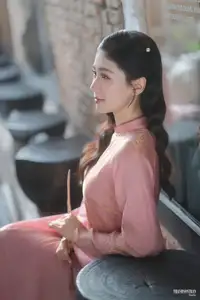 Serene Beauty of a Lady in Pink Traditional Dress with Spring Blossoms - image 16