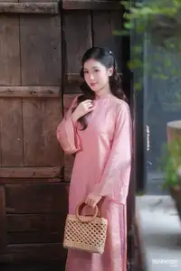 Serene Beauty of a Lady in Pink Traditional Dress with Spring Blossoms - image 19
