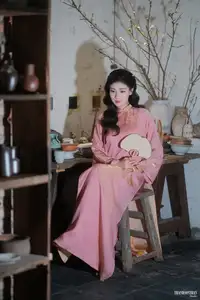 Serene Beauty of a Lady in Pink Traditional Dress with Spring Blossoms - image 10