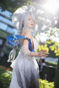 Coser Feng Jiang Jiang V as Shenhe Genshin Impact: Ethereal Beauty in a Captivating Outdoor Shoot - image 2