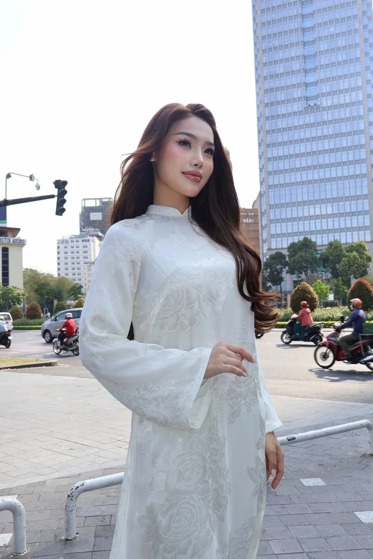 Vietnamese Pageant Queens Celebrate Reunification Day in Traditional Red Ao Dai